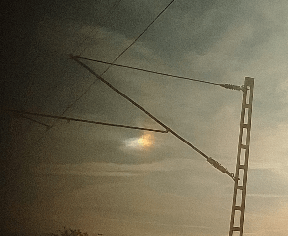 Sun halo, seen from a moving train, which is just not ideal